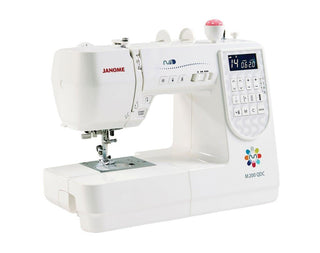 Janome M200 QDC Sewing Machine - includes auto thread cut, extension table, hard cover.